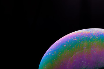 Soap bubble isolated on black