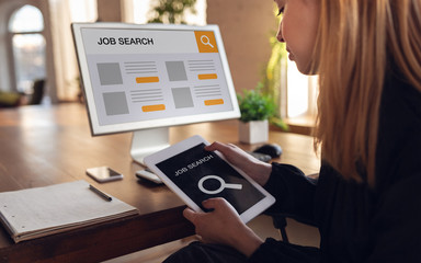 Woman looking for a job during worldwide crisis. Find a job online. Business, internet and networking concept. Woman looks through vacancies and sends resumes, needs to earn. Modern digital search bar