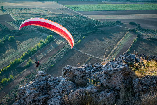 Paragliding with sunset sky and wind