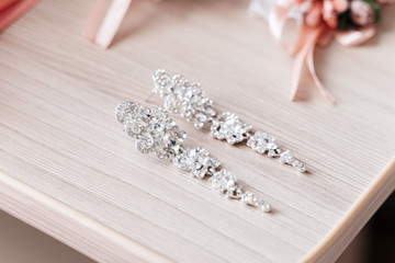 Crystal earrings lie ha table
