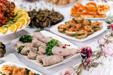 bacon dish wrapped roll on the table