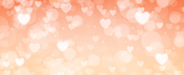 Glowing orange and blue bokeh background. Spring concept. Blurred bokeh circles and hearth shapes.