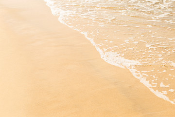 Clean fine sand beach and white wave, summer holiday, nature background, outdoor day light