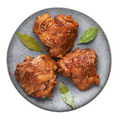 Filipino Chicken Adobo on gray plate isolated on white backdrop. Chicken Adobo is Filipino cuisine dish of braised chicken thighs, soy sauce, vinegar, black pepper and bay leaves. Filipino food