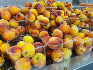 fresh peaches in a market