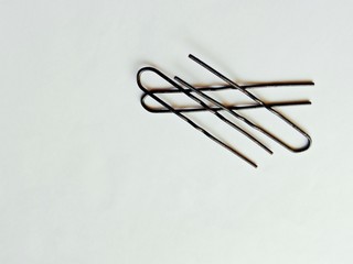 hair pin isolated on white background,black curvy pins.