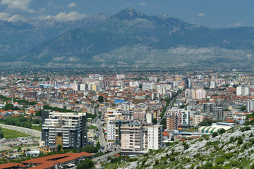 Aerial panoramic view of principal city Shkoder between mountains, Albania
