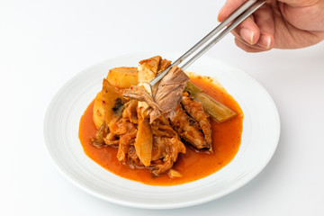 Stewed mackerel on white background