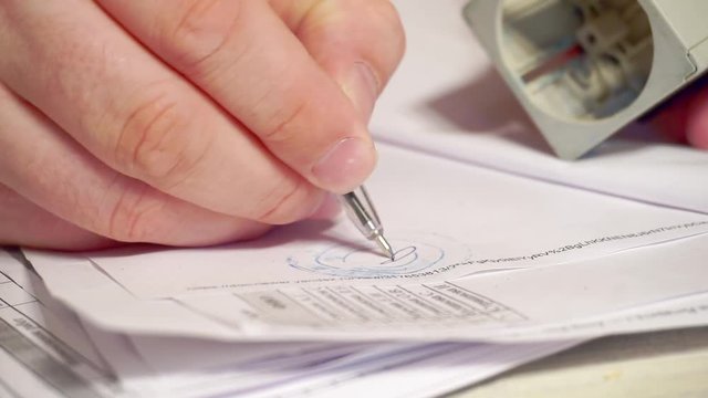 business concept.stamping paper documents with a seal