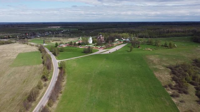 Aerial: Flight to the Spaso-Borodinsky monastery, Borodino, Russia. May, 2020. Monastery was founded in 1839 by Margarita Tuchkova, the widow of General Aleksandr Tuchkov.