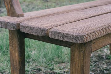 Fototapeta premium Creative bench with pine back in nature