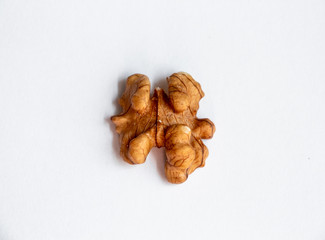 walnut on a white background, walnut halves, close-up