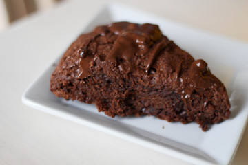 This is a Slice of rich and moist chocolate cake. Also moist, dark, and covered in chocolate ganache. The Most Amazing Chocolate Cake. It’s easy to make and decorate a simple chocolate sponge cake