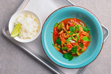 Colorful Asian meat and vegetable dish. Sweet and sour pork and mixed vegetable delicacy. Tasty dinner.