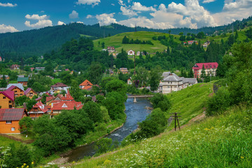 Scenic view of mountain resort Vorokhta in Carpathian Mountains at sunny summer day, Ukraine