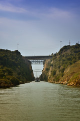 Fototapeta premium Corinth Canal, tidal waterway across the Isthmus of Corinth in Greece, joining the Gulf of Corinth with the Saronic Gulf