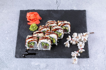 Sushi roll sushi with prawn, avocado, cream cheese, sesame. Sushi menu. Japanese food.