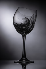broken sharp glass on dark black background