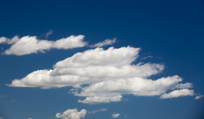 blue sky and clouds flowing with the wind