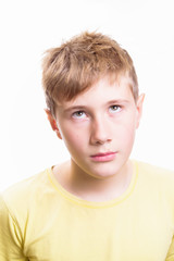 Emotional portrait of a 10-12 years boy. Emotional Portrait of sadness, depression and anxiety.