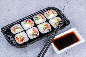 Sushi roll sushi with prawn, avocado, cream cheese, sesame. Sushi menu. Japanese food.