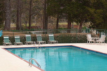 Chairs by Swimming Pool