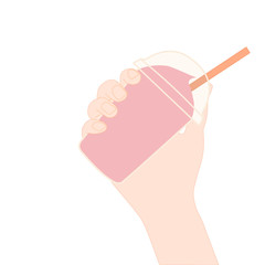 Hand is holding​ a pink smoothie. A cold soft drink for summer. Sweet beverage. Tasty and yummy food. A takeaway Product logo or advertisement.