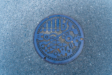manhole cover in the street