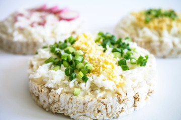 delicious vegetarian Breakfast rice waffles with grated egg and green onions