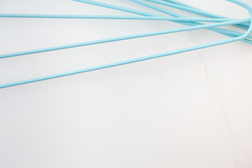  Abstract white background with blue elements and text space. Blue frame on a white paper background, top view