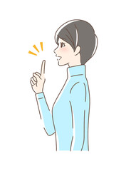 笑顔で指をさす女性の横顔