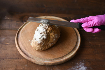 homemade bread with sesame seeds. cook in the kitchen at home during the coronavirus crisis. Stay at home. Enjoy cooking at home. Wholemeal bread. Healthy bread