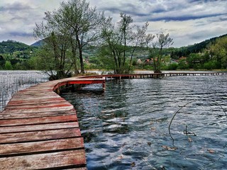 wooden bridge over the lake