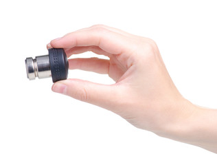 Car cigarette lighter in hand on white background isolation