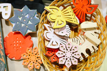 Colored (yellow, white, red, blue) wooden molds(forms, shape)  for beating for decoration handmade patterns of angel, horse and star