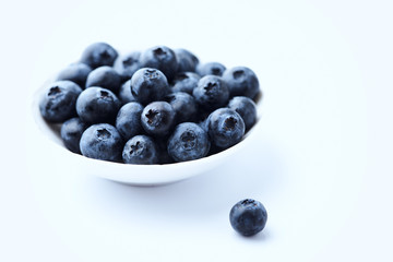 Bilberries isolated on white background. Concept for healthy nutrition. Copy space.