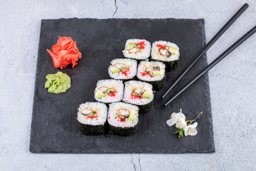 Sushi roll sushi with prawn, avocado, cream cheese, sesame. Sushi menu. Japanese food.