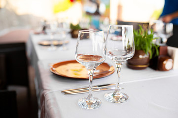 Stylish table setting in an open-air restaurant.