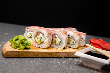 Rolls with ham, cheese and vegetables. Wood surface. Photo for the menu