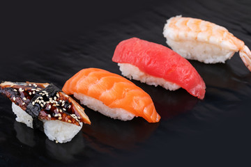 Japanese seafood sushi, on black background