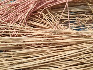 Wheat flour macaroni dry closed up full texture background.