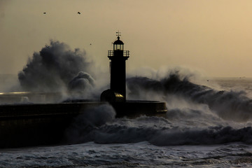 Entry of Douro River harbor on big stormy waves