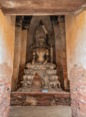 Buddha statues inside Wat Chaiwatthanaram temple in Ayutthaya Historical Park, Thailand