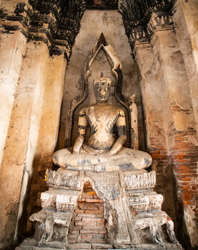 Buddha statues inside Wat Chaiwatthanaram temple in Ayutthaya Historical Park, Thailand