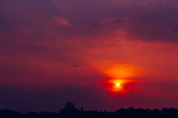 The rising sun shines red. Orange is a beautiful world background