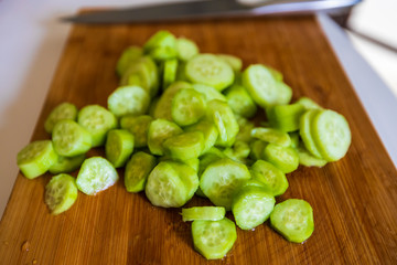Tray with cucumbers cut into a buffet
