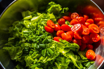 Green salad with tomato and fresh vegetables