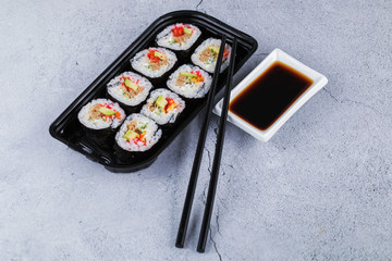 Sushi roll sushi with prawn, avocado, cream cheese, sesame. Sushi menu. Japanese food.