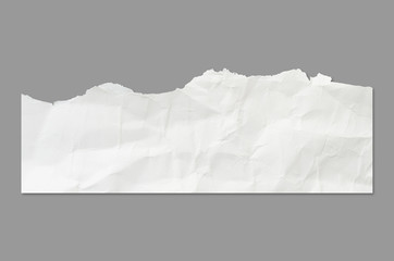 White ripped note, notebook crumpled paper stuck with sticky tape on black background with clipping path.