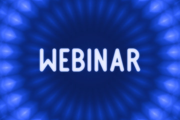 Webinar- word on a blue background